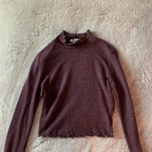 cropped lettuce hem turtle neck top